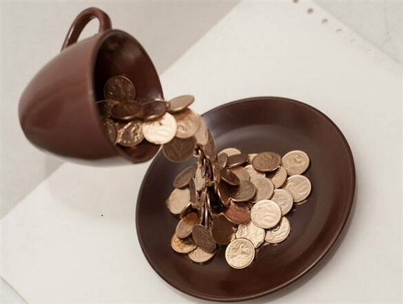 a cup of coins to attract money